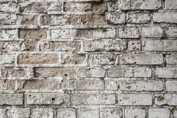 texture of an old ruined brick wall of an ancient building