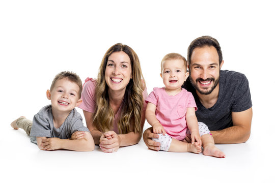 happy smiling family of four isolated on white background