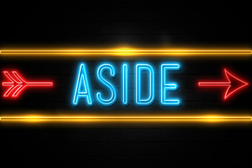 Aside  - fluorescent Neon Sign on brickwall Front view