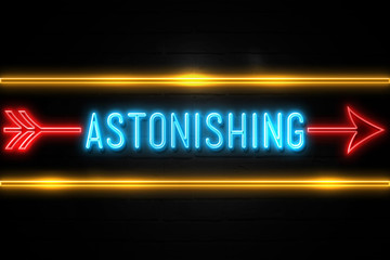 Obraz premium Astonishing - fluorescent Neon Sign on brickwall Front view