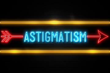 Astigmatism  - fluorescent Neon Sign on brickwall Front view