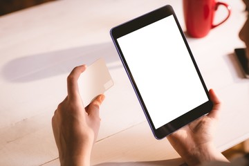 Executive using digital tablet