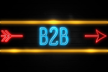 B2b  - fluorescent Neon Sign on brickwall Front view