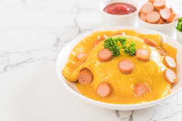 Creamy Omelet with Sausage on Rice