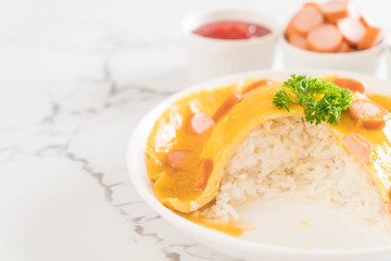 Creamy Omelet with Sausage on Rice