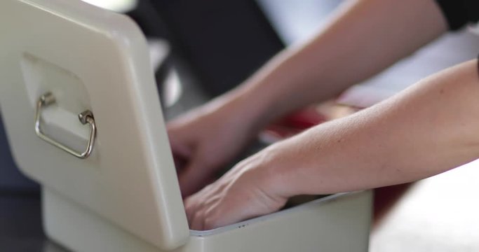 Food truck owner giving cash change to customer