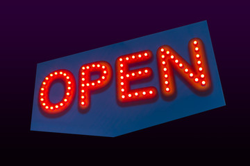 colorful led OPEN sign. isolated on dark background with clipping part