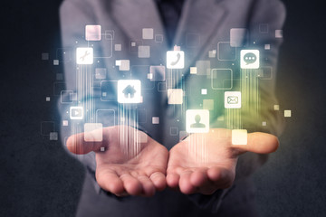 Businessman holding blue applications