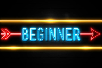 Beginner  - fluorescent Neon Sign on brickwall Front view