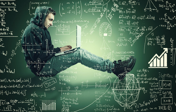 Young man working on laptop - Powered by Adobe