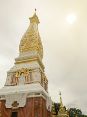 white pagoda at Wat Phra That Phanom.Thailand