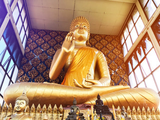 Gold Buddha statue in the chapel- thailand