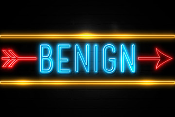 Benign  - fluorescent Neon Sign on brickwall Front view