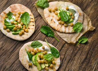 Flatbread with chickpea and avocado.