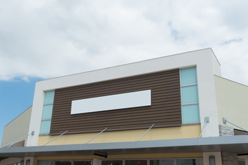 Large blank billboard on a street wall, banners with room to add your own text