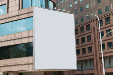 Large blank billboard on a street wall, banners with room to add your own text
