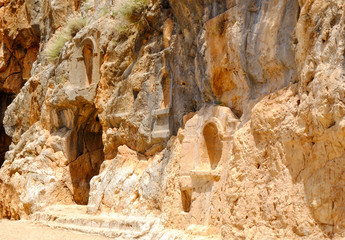 Rock with architectural elements of ancient civilization in old town