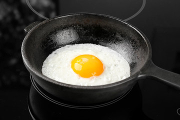 Cooking of delicious sunny side up egg