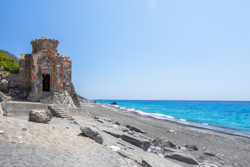 Agios Pavlos beach with Saint Paul church, a very old Byzantine church that was built at the place Selouda, an incredible beach at Opiso Egiali area.