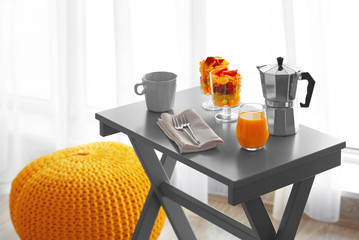 Table with delicious breakfast on the balcony