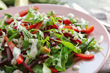Plate with fresh beet salad, close up