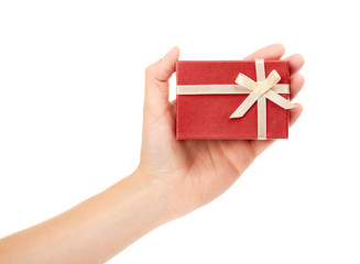 female hand holding red present box. Isolated on white background