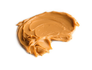 Creamy peanut butter on white background