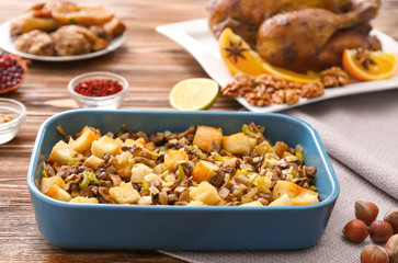 Turkey stuffing in blue casserole dish on kitchen table