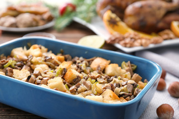 Turkey stuffing in blue casserole dish on kitchen table