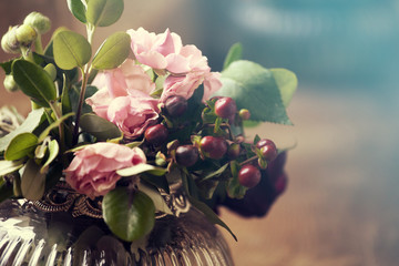 Pink flowers in a antique vase