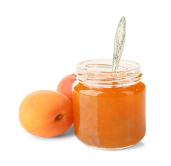 Apricot jam in jar with spoon and fresh fruit isolated on white