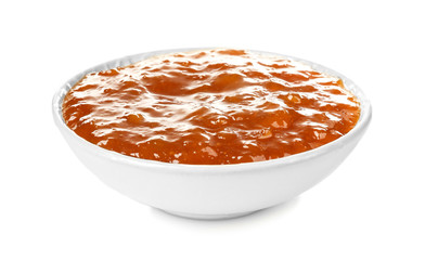 Apricot jam in bowl, isolated on white