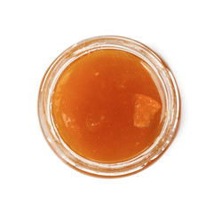 Apricot jam in jar, isolated on white