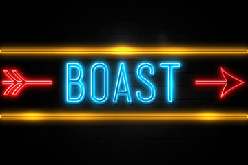 Boast  - fluorescent Neon Sign on brickwall Front view