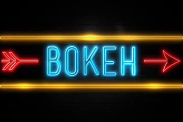 Bokeh  - fluorescent Neon Sign on brickwall Front view