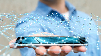 Businessman holding flying network dot over phone 3D rendering