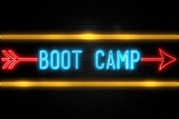 Boot Camp  - fluorescent Neon Sign on brickwall Front view