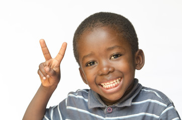 African black boy making peace sign for Africa (african ethnicity huge smile peace for the world)