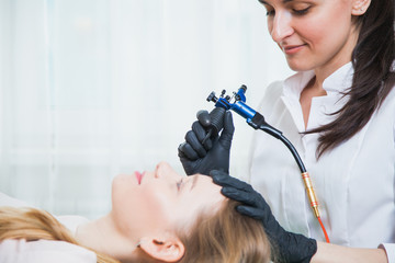 Process of applying permanent makeup tattoo pen machine
