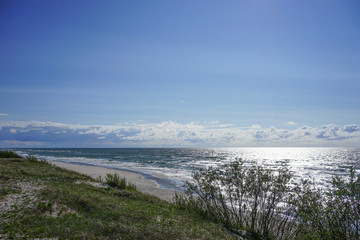 Deserted seascape on the Baltic sea and sand dunes