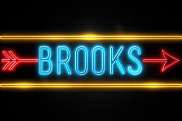 Brooks  - fluorescent Neon Sign on brickwall Front view