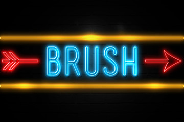 Brush  - fluorescent Neon Sign on brickwall Front view