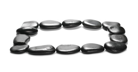 Pile black rocks isolated on white background and texture