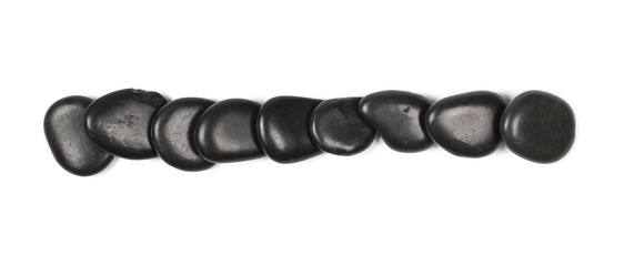 Obraz premium Pile black rocks isolated on white background and texture, top view