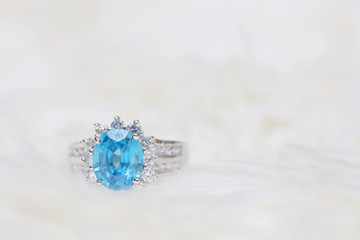 diamond ring and blue gemstone