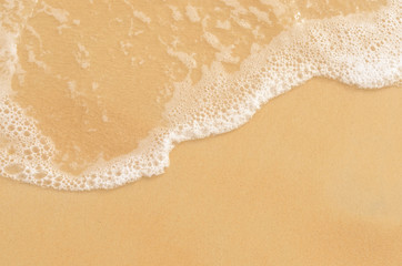 Copy space smooth wave beach with sand texture abstract background.