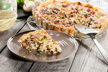 Slice of tart with chicken amd mushrooms