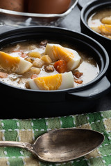 The sour soup made of rye flour with eggs