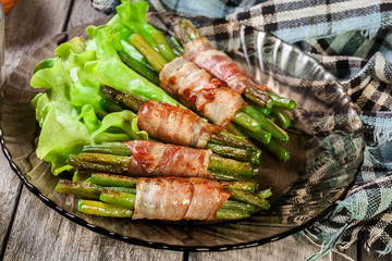 Fried green bean wrapped in smoked bacon