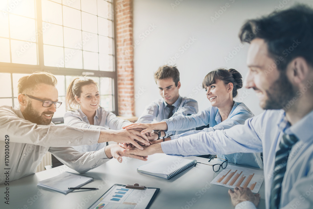 Fototapete stack of hands. unity and teamwork concept.